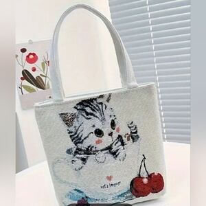 Small embroidered kitten bag